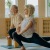 Lifestyle photo of a man and woman doing yoga